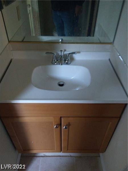 1608 N Torrey Pines Dr Unit 103, Las Vegas, NV 89108 - bathroom featuring vanity and tile patterned floors