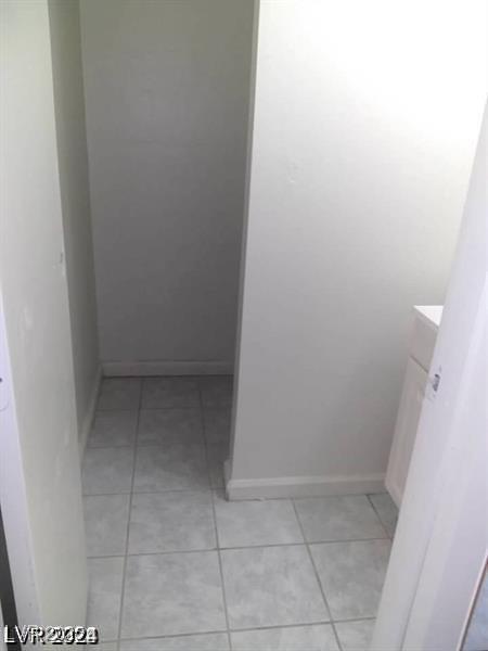 3435 Villa Knolls S Dr, Las Vegas, NV 89120 - bathroom with vanity and tile patterned floors