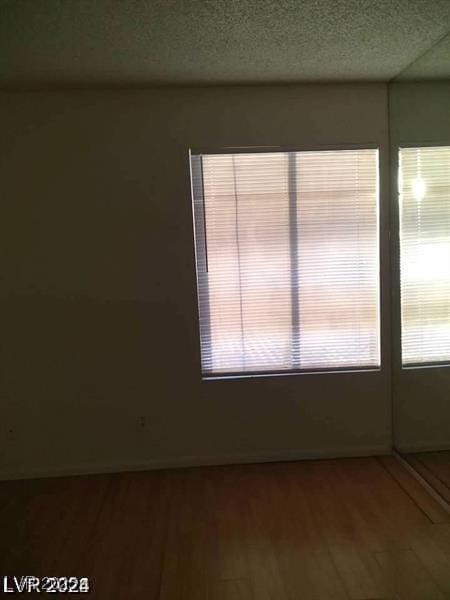 3435 Villa Knolls S Dr, Las Vegas, NV 89120 - spare room with wood finished floors