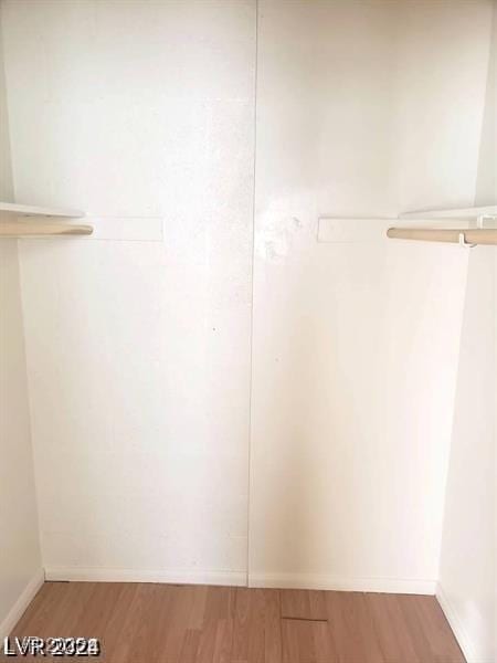 3435 Villa Knolls S Dr, Las Vegas, NV 89120 - spacious closet with light wood-style floors