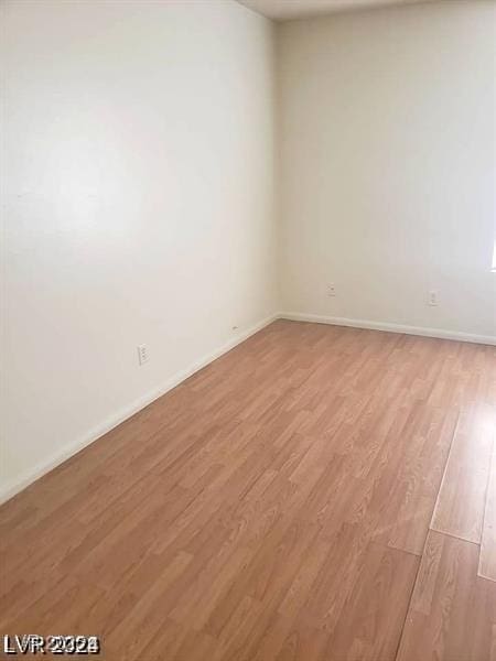 3435 Villa Knolls S Dr, Las Vegas, NV 89120 - empty room featuring light wood finished floors and baseboards