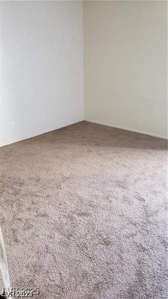 1336 N Jones Blvd, Las Vegas, NV 89108 - carpeted spare room with baseboards