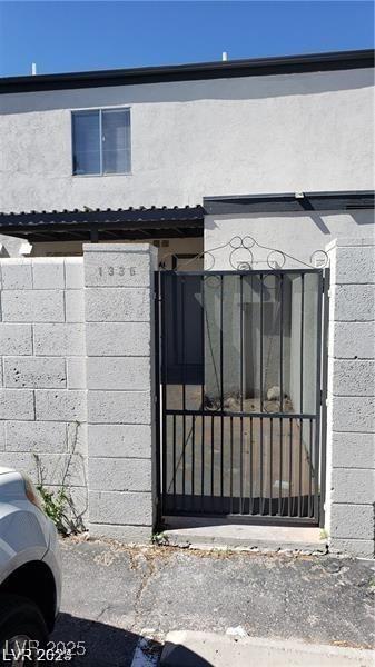1336 N Jones Blvd, Las Vegas, NV 89108 - gate with a fenced front yard