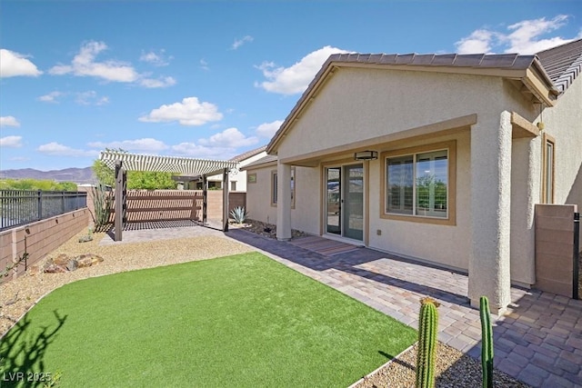 3096 Beaux Art Ave, Henderson, NV 89044 - rear view of property with a pergola, stucco siding, and a patio area