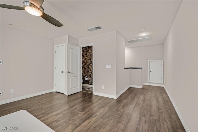 3096 Beaux Art Ave, Henderson, NV 89044 - empty room featuring a ceiling fan, wood finished floors, and baseboards