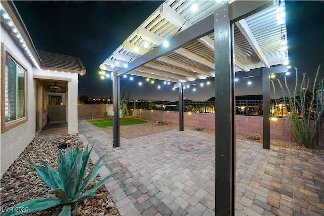 3096 Beaux Art Ave, Henderson, NV 89044 - patio at twilight featuring a fenced backyard and a patio