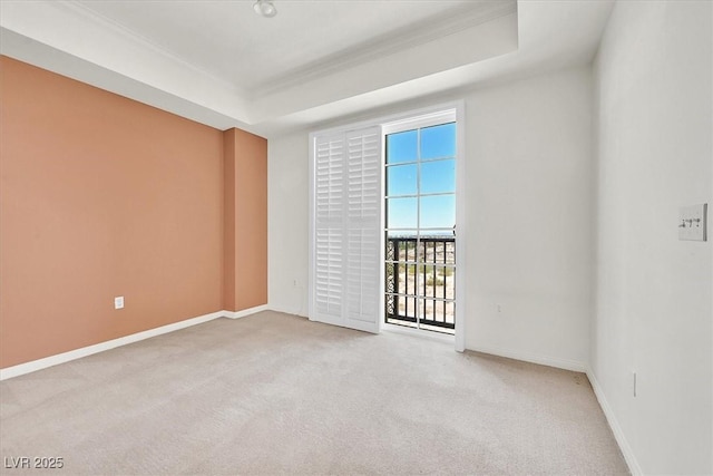 2455 W Serene Ave Unit 851, Las Vegas, NV 89123 - spare room with light colored carpet, crown molding, baseboards, and a tray ceiling