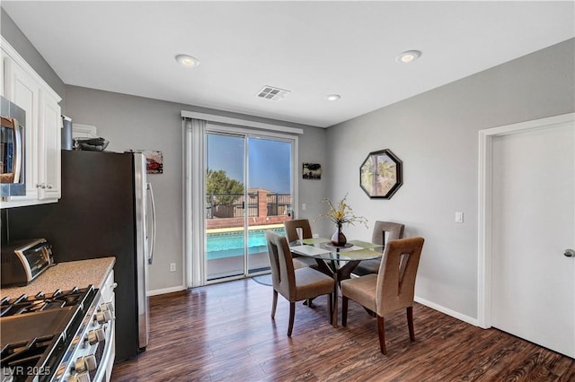 4020 Driscoll Mountain St, Las Vegas, NV 89129 - dining room featuring dark wood-type flooring, baseboards, and recessed lighting