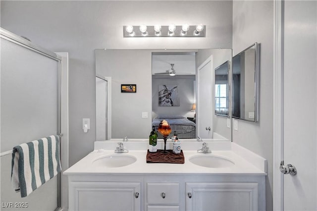 4020 Driscoll Mountain St, Las Vegas, NV 89129 - bathroom featuring connected bathroom, double vanity, and a ceiling fan