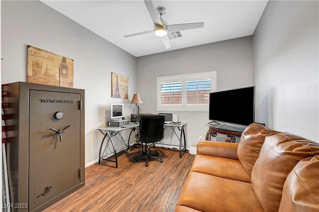 4020 Driscoll Mountain St, Las Vegas, NV 89129 - home office featuring wood finished floors, a ceiling fan, and baseboards
