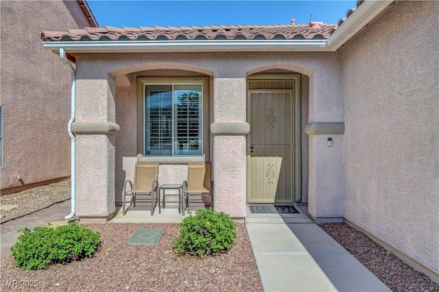 4020 Driscoll Mountain St, Las Vegas, NV 89129 - doorway to property featuring stucco siding