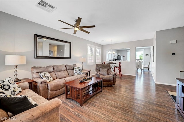 4020 Driscoll Mountain St, Las Vegas, NV 89129 - living room featuring dark wood-style flooring, ceiling fan, and healthy amount of natural light