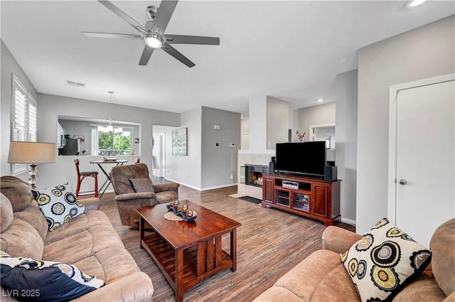 4020 Driscoll Mountain St, Las Vegas, NV 89129 - living area with wood finished floors, a ceiling fan, baseboards, a chandelier, and recessed lighting