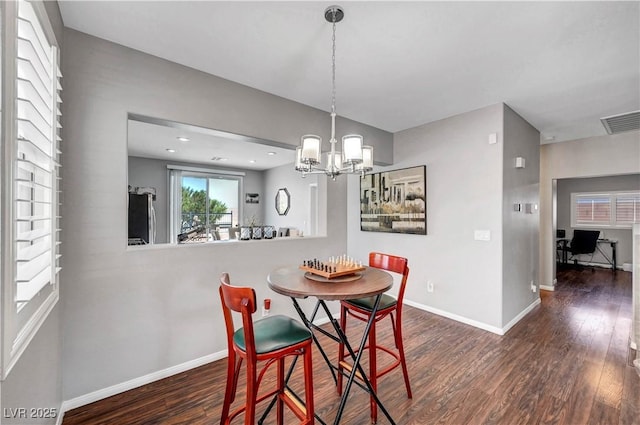 4020 Driscoll Mountain St, Las Vegas, NV 89129 - dining space with wood finished floors, baseboards, and a chandelier