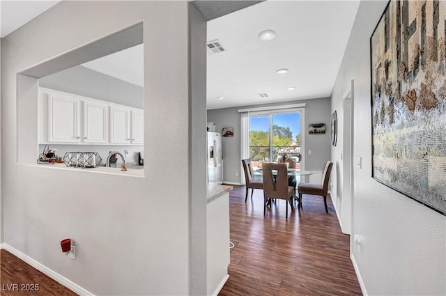 4020 Driscoll Mountain St, Las Vegas, NV 89129 - corridor with dark wood-style flooring, baseboards, and recessed lighting