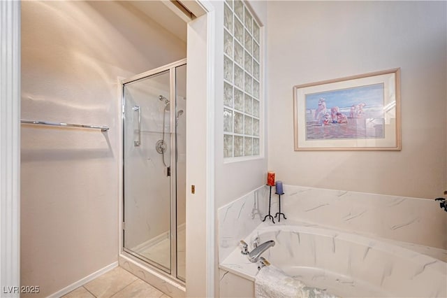 2801 Byron Dr, Las Vegas, NV 89134 - bathroom with a garden tub, a stall shower, and tile patterned floors