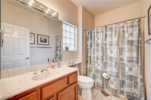2801 Byron Dr, Las Vegas, NV 89134 - full bath with tile patterned floors, toilet, vanity, and a shower with shower curtain