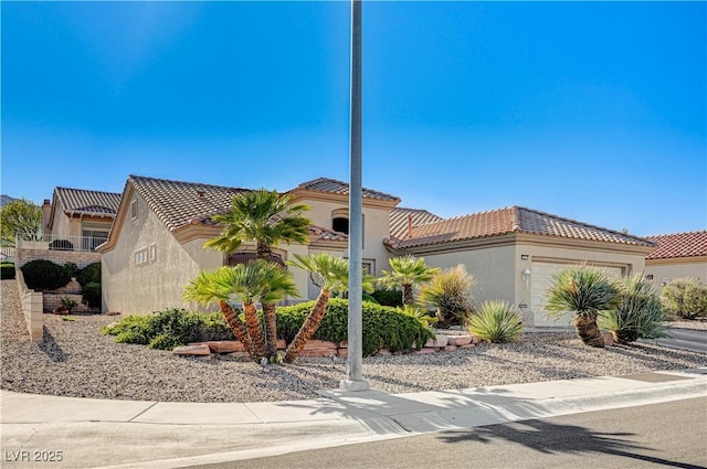 2801 Byron Dr, Las Vegas, NV 89134 - view of front of house with a garage, stucco siding, and a tiled roof