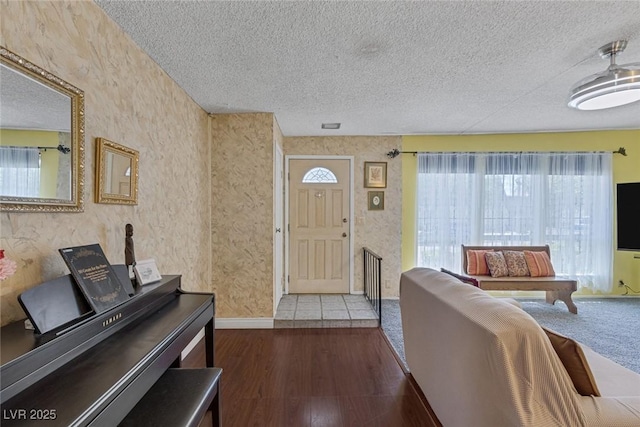 3815 Atlantis St, Las Vegas, NV 89121 - foyer entrance featuring a textured ceiling, wood finished floors, and baseboards