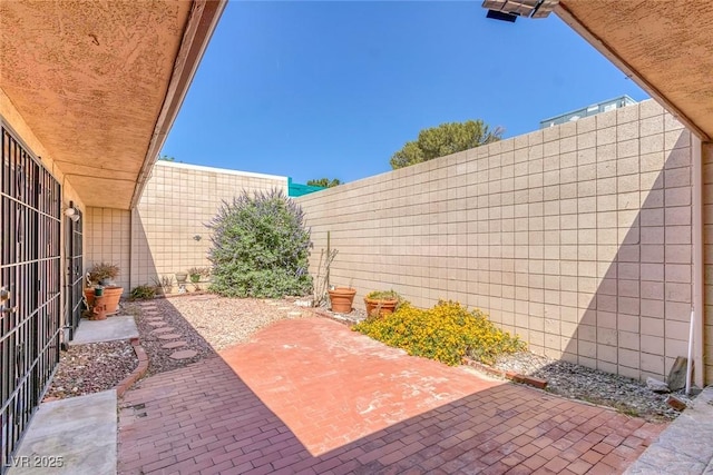 3815 Atlantis St, Las Vegas, NV 89121 - fenced backyard with a patio