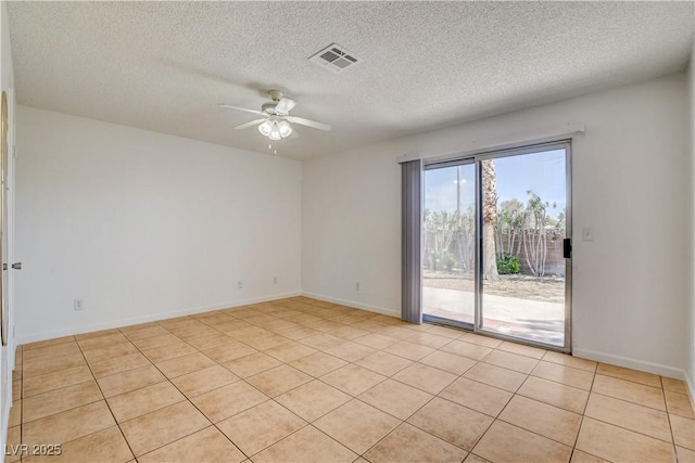 6521 Faith Peak Dr, Las Vegas, NV 89108 - empty room featuring ceiling fan, light tile patterned flooring, a textured ceiling, and baseboards