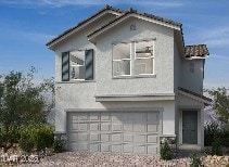9082 Rivington Ave, Las Vegas, NV 89148 - view of front of house featuring an attached garage, stucco siding, and driveway