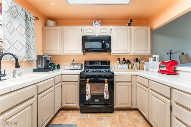 2851 S Valley View Blvd Unit 1071, Las Vegas, NV 89102 - kitchen featuring black appliances, a sink, and tile counters