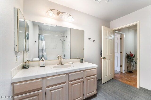 2851 S Valley View Blvd Unit 1071, Las Vegas, NV 89102 - bathroom featuring vanity, a shower with curtain, and wood finished floors