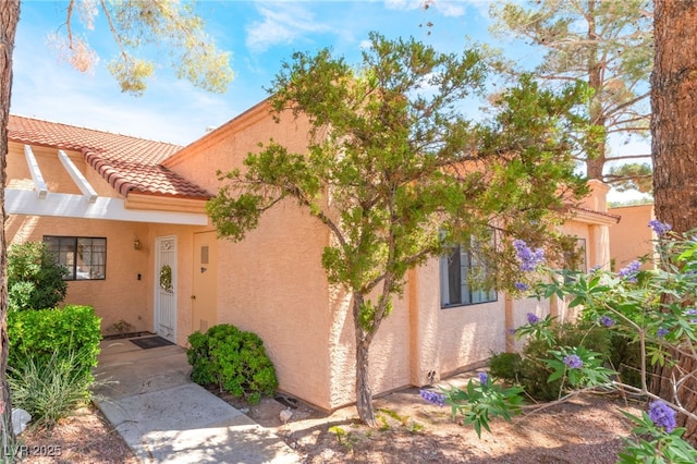 2851 S Valley View Blvd Unit 1071, Las Vegas, NV 89102 - view of front of home featuring stucco siding and a tile roof