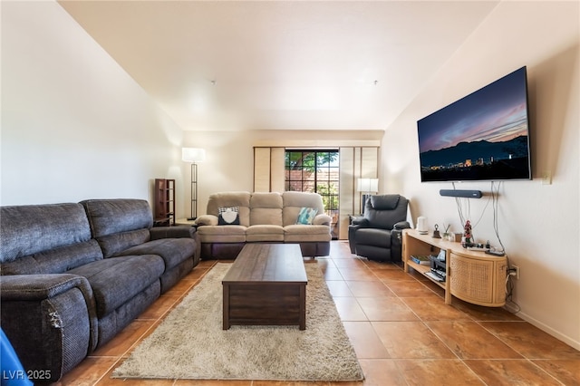 2851 S Valley View Blvd Unit 1071, Las Vegas, NV 89102 - living area with vaulted ceiling and tile patterned flooring