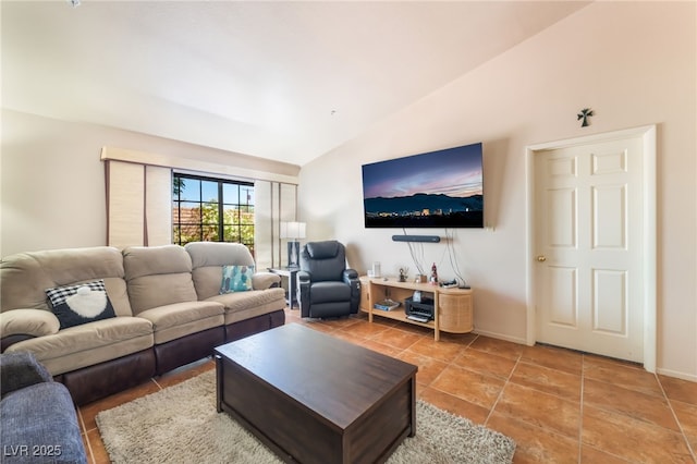 2851 S Valley View Blvd Unit 1071, Las Vegas, NV 89102 - living area featuring vaulted ceiling, light tile patterned floors, and baseboards