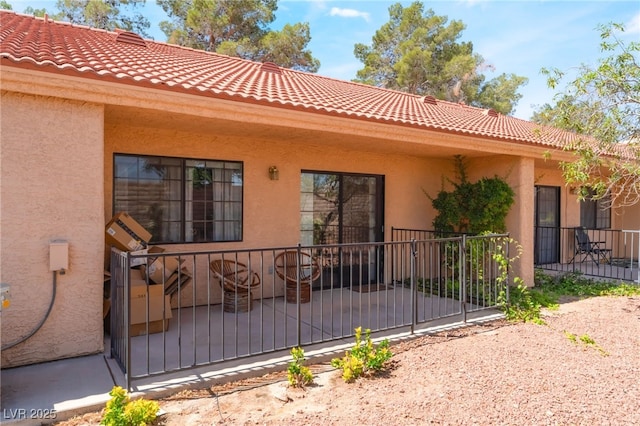 2851 S Valley View Blvd Unit 1071, Las Vegas, NV 89102 - back of property with a tiled roof and stucco siding