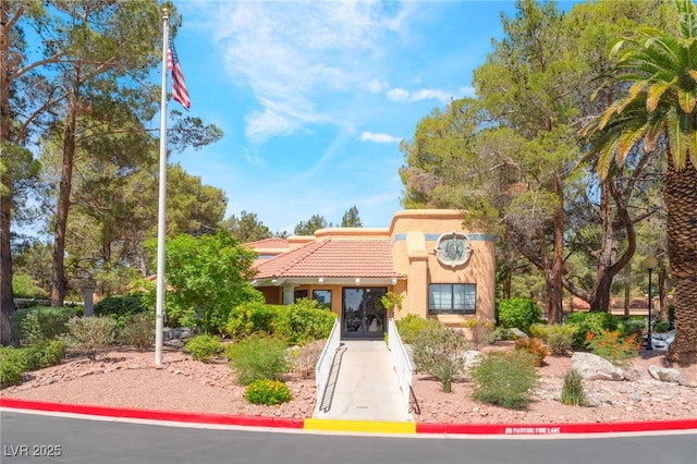 2851 S Valley View Blvd Unit 1071, Las Vegas, NV 89102 - view of front of house with a tile roof and stucco siding