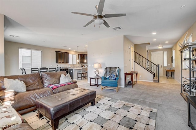 9846 Sunriver Meadows Ave, Las Vegas, NV 89148 - living area with a ceiling fan, stairs, light colored carpet, recessed lighting, and baseboards