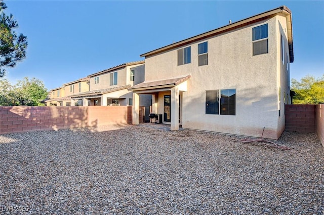 9846 Sunriver Meadows Ave, Las Vegas, NV 89148 - back of property with a fenced backyard and stucco siding