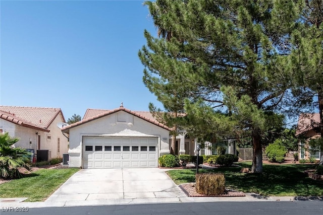 4904 Wiltondale Way, Las Vegas, NV 89130 - view of front facade featuring concrete driveway, a garage, a tile roof, and stucco siding