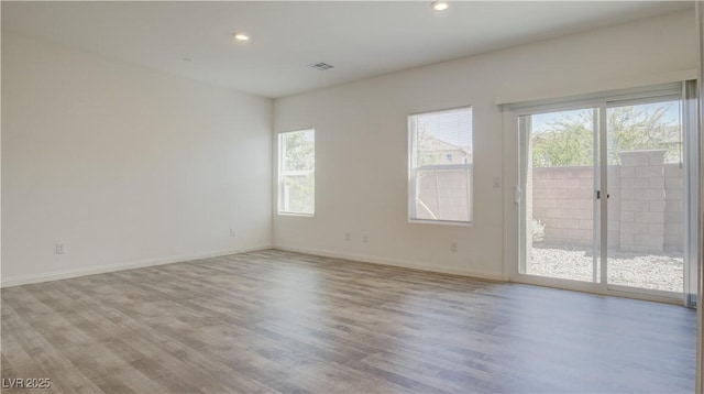 4229 Venus Falls Ave, North Las Vegas, NV 89084 - empty room with wood finished floors, recessed lighting, and baseboards