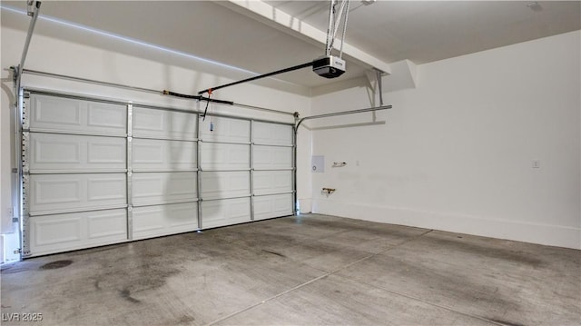 4229 Venus Falls Ave, North Las Vegas, NV 89084 - garage with a garage door opener and baseboards
