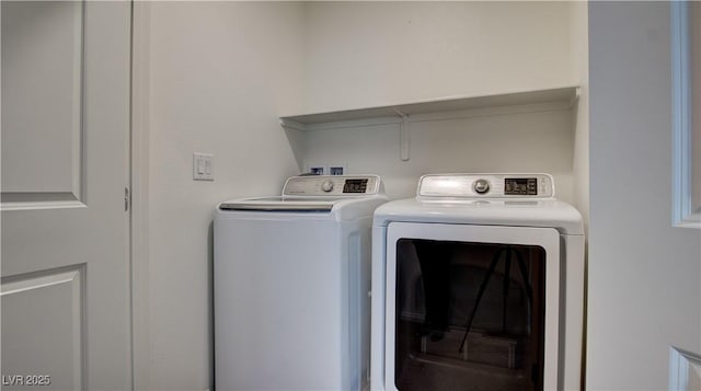 4229 Venus Falls Ave, North Las Vegas, NV 89084 - laundry room with washer and clothes dryer