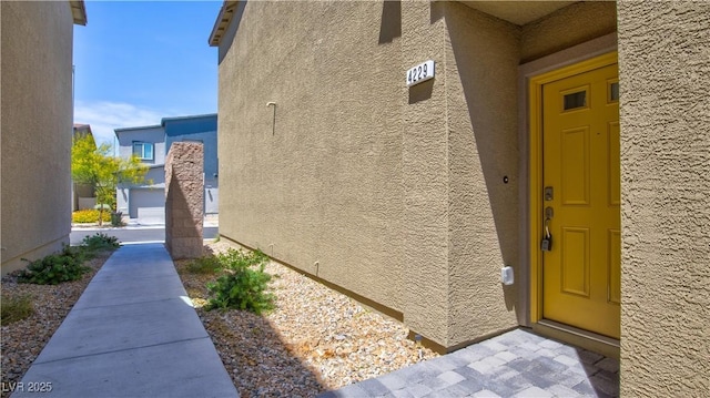 4229 Venus Falls Ave, North Las Vegas, NV 89084 - view of exterior entry featuring stucco siding