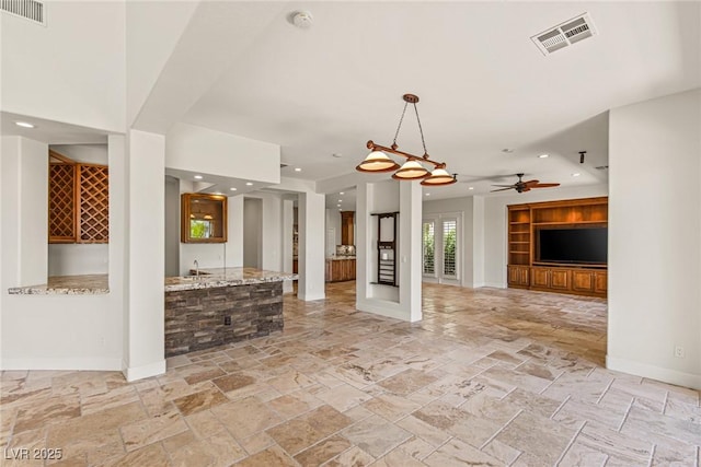 2436 Grassy Spring Pl, Las Vegas, NV 89135 - unfurnished living room with stone tile flooring, recessed lighting, and ceiling fan
