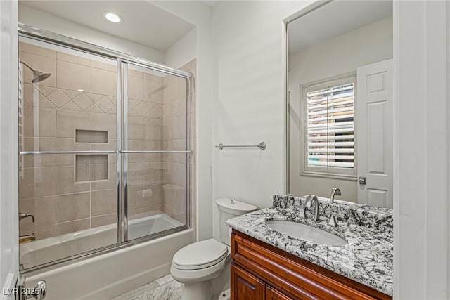 2436 Grassy Spring Pl, Las Vegas, NV 89135 - bathroom featuring vanity, bath / shower combo with glass door, and recessed lighting