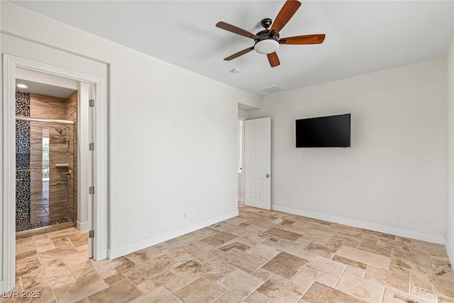 2436 Grassy Spring Pl, Las Vegas, NV 89135 - spare room with light stone finish floors and a ceiling fan