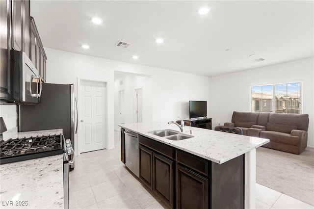 2495 Sunflower Days Ave Unit 2052, North Las Vegas, NV 89031 - kitchen with a sink, appliances with stainless steel finishes, open floor plan, a kitchen island with sink, and recessed lighting