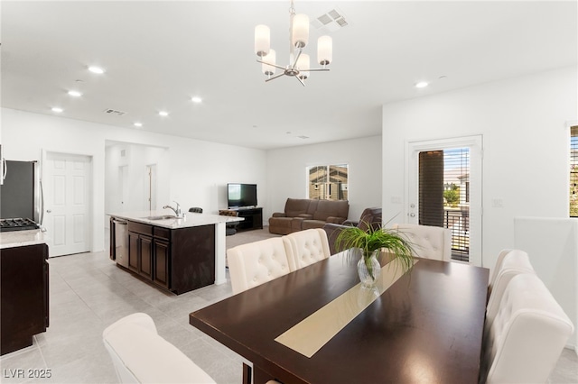 2495 Sunflower Days Ave Unit 2052, North Las Vegas, NV 89031 - dining area featuring a chandelier, recessed lighting, and light tile patterned floors