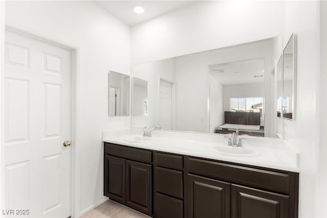2495 Sunflower Days Ave Unit 2052, North Las Vegas, NV 89031 - ensuite bathroom with double vanity and tile patterned flooring