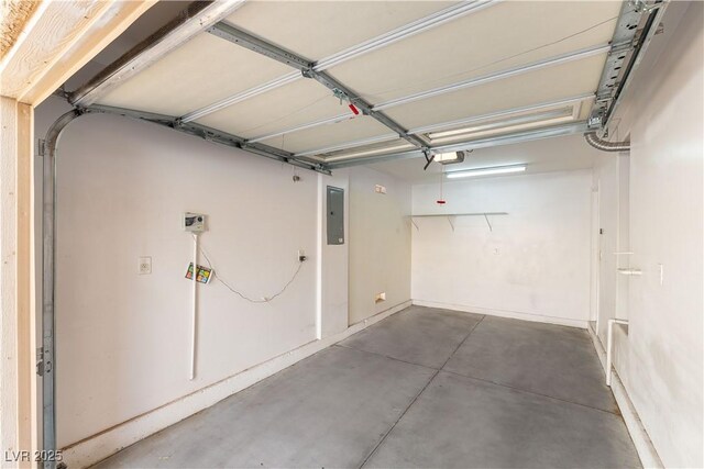 7923 Homer Ct, Las Vegas, NV 89139 - garage with electric panel and a garage door opener