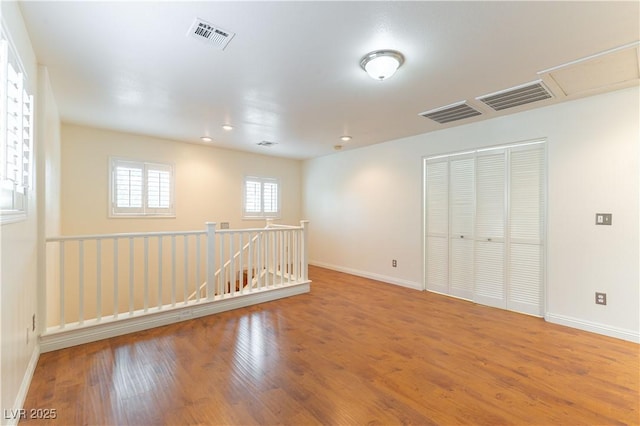 7923 Homer Ct, Las Vegas, NV 89139 - spare room with wood finished floors and baseboards