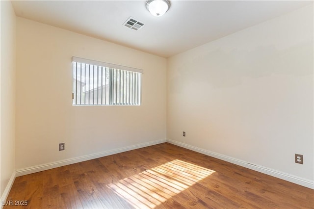 7923 Homer Ct, Las Vegas, NV 89139 - unfurnished room featuring wood finished floors and baseboards