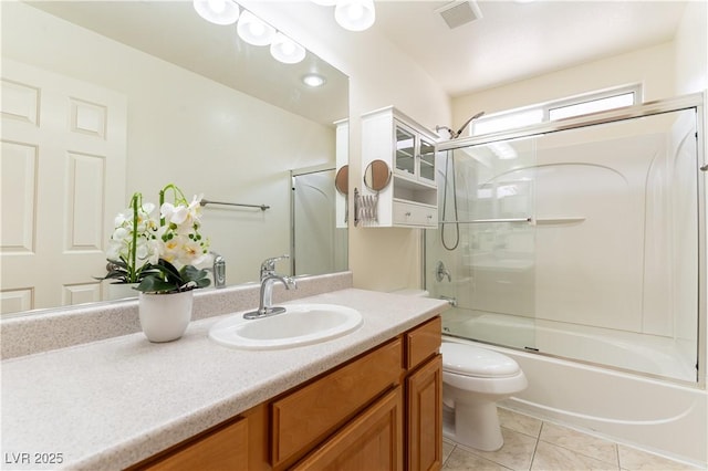 7923 Homer Ct, Las Vegas, NV 89139 - full bath with vanity, toilet, enclosed tub / shower combo, and tile patterned floors